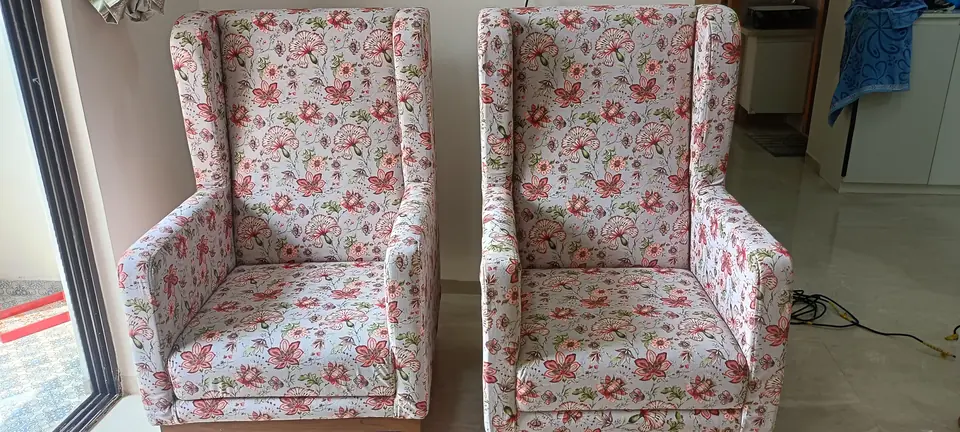 Two fabric wingback armchairs freshly deep-cleaned by Steam Car Spa at a home in Silvassa
